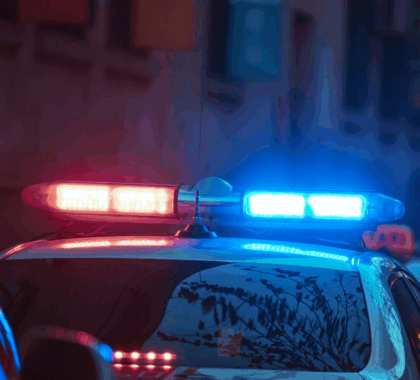 Police lights shining in the dark