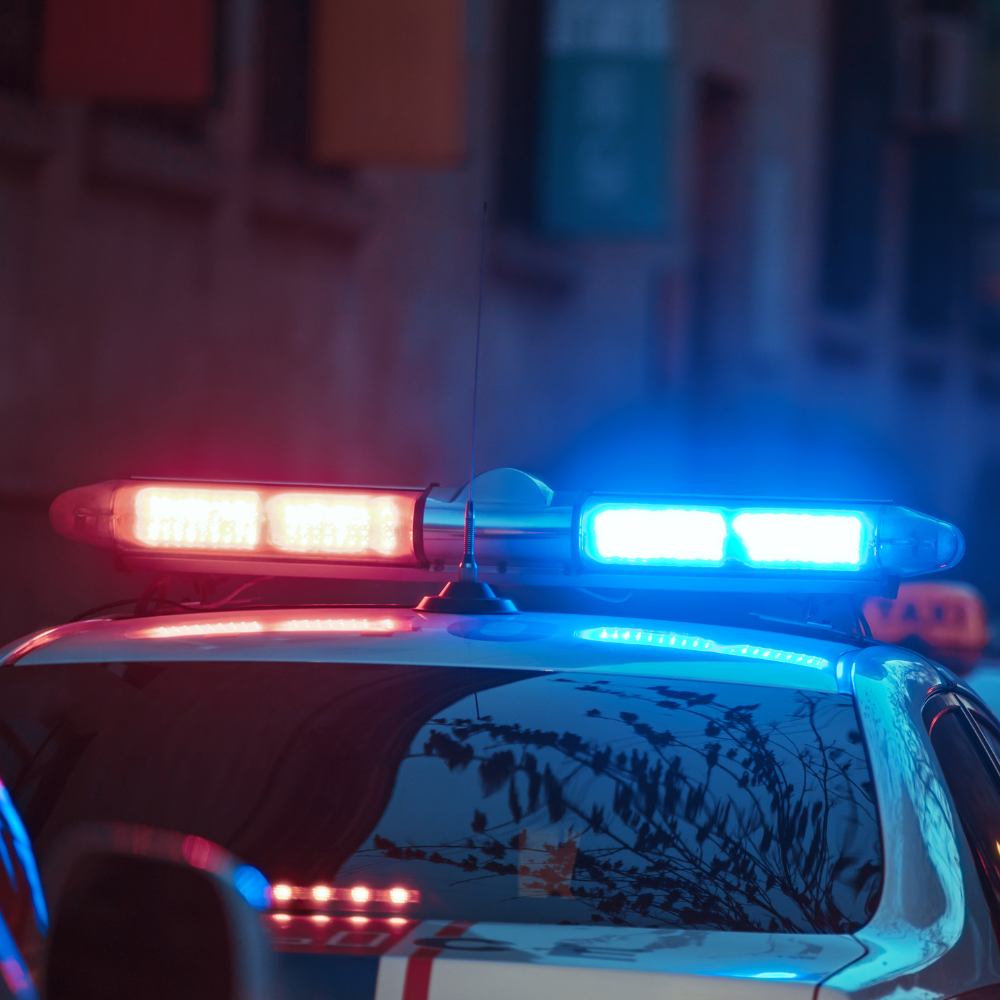 Police lights shining in the dark