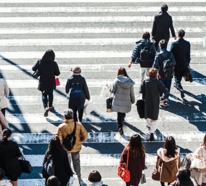A group of pedestrians crossing a crosswalk