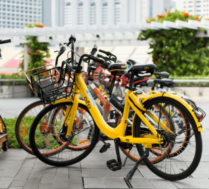 Bicycles lined up on the sidewalk