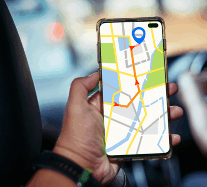 A smartphone screen shows a directional map with the end location highlighted